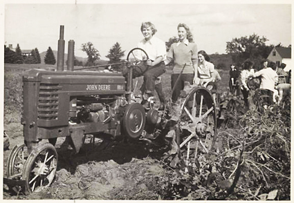 students-riding-tractor-at-the-victory-garden-1943.jpeg